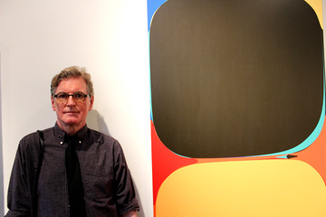 Jef Bourgeau with one of his paintings at Galerie Camille