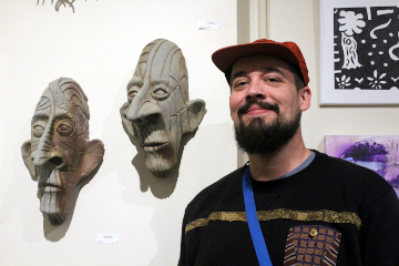 Brett with two of his pieces at Detroit Contemporary