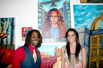 Chris Batten and Carolyn Webber with the former's painting of the latter
