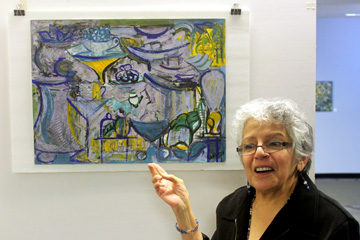 Diana with one of her paintings