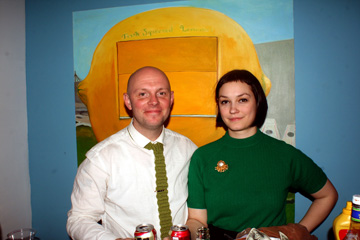 Jaye and Lisa in front of one of her paintings at Corktown Studios.