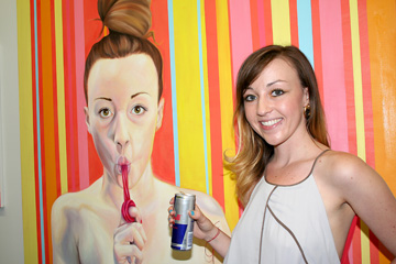 Michelle Tanguay next to her painting at the Red Bull House of Art.