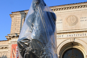 Rodin's Thinker, wrapped, in front of the Detroit Institute of Arts