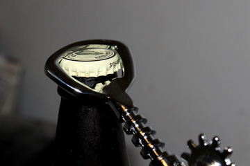 A cork remover might also open a bottle of beer